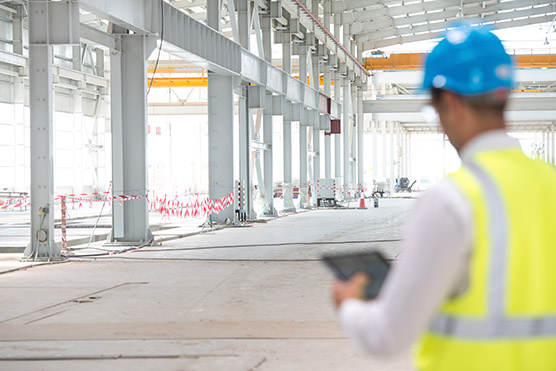 stock-photo-65959241-construction-foreman-checking-progress